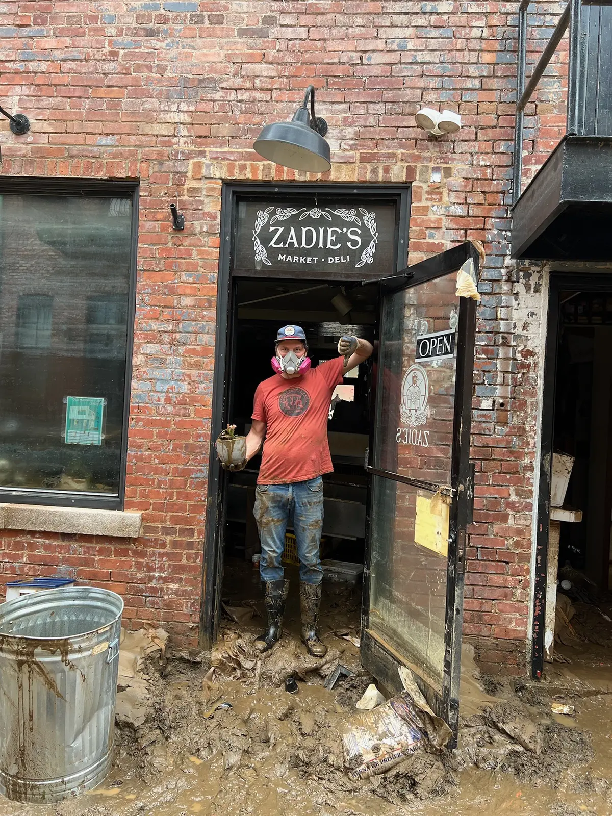Zadie's Market owner at the doorway, Madison County, NC